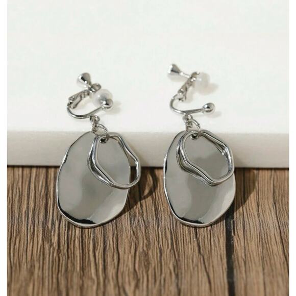 Clip on 1 3/4" shiny silver odd shaped layered dangle earrings - Picture 1 of 4